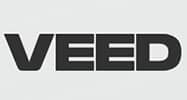 Veed | tycoonstory media Veed logo in bold black letters on a light gray background