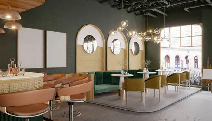 Digital habits intensify the cinematic shift - tycoonstory | tycoonstory media Contemporary café interior with cinematic architectural design, featuring arched wall elements, ambient pendant lighting, curved seating arrangements, and layered textures, illustrating how architecture is becoming more cinematic by blending hospitality spaces with film-like visual storytelling, mood-driven lighting, and immersive spatial composition.