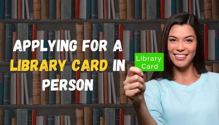 Library card application 1 | tycoonstory media Local library card application in person with a woman holding a library card