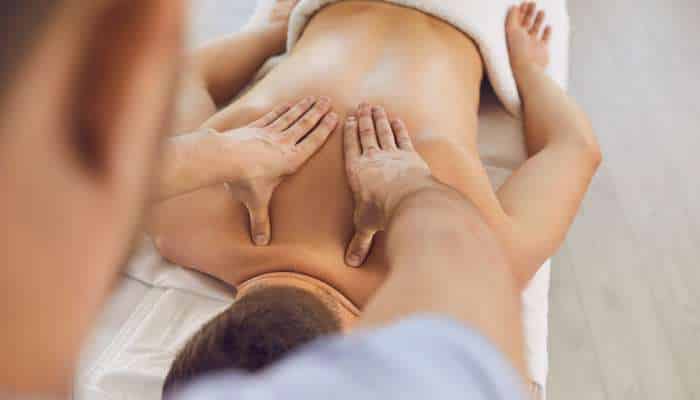 Professional massage 1 | tycoonstory media Therapeutic massage destin fl deep tissue back massage relieving muscle tension and improving relaxation during professional body therapy session