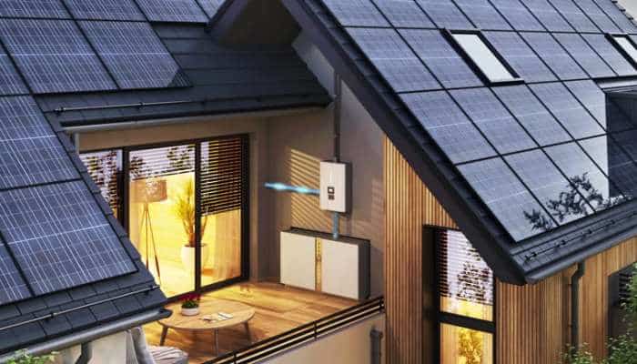 Residential energy storage 1 | tycoonstory media Residential energy storage system integrated into a modern home with rooftop solar panels and wall-mounted battery unit, illustrating a complete solar-plus-storage setup for efficient energy management.
