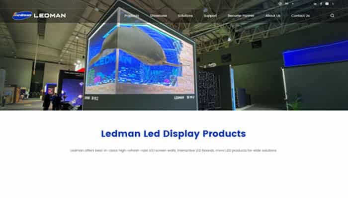 Ledman optoelectronic (cob leader) - tycoonstory | tycoonstory media Trade show booth for ledman with a large cube-shaped led display showing an underwater scene.