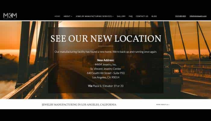 Top 5 custom jewelry manufacturers for large brands | tycoonstory media Banner announcing a new jewelry factory location with a sunset bridge backdrop and an overlay listing the new address.