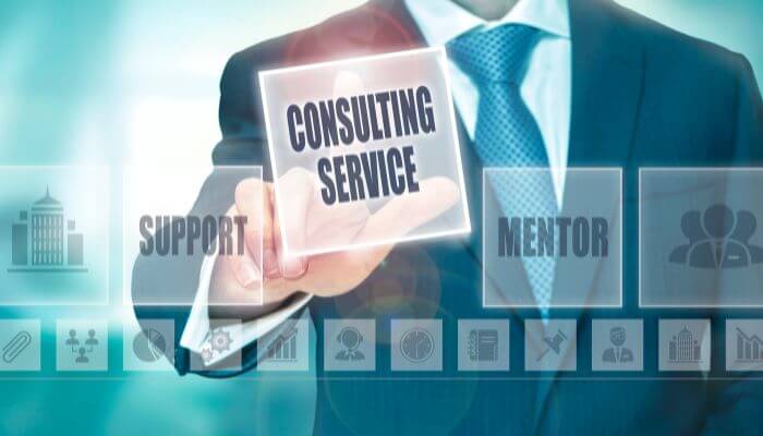 Ai marketing consultant services 1 | tycoonstory media Professional in a suit selects 'consulting service' on a glowing touchscreen interface.