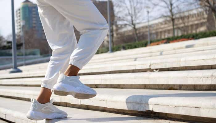 Can you wear it for walking - tycoonstory | tycoonstory media Person walking up outdoor steps wearing the roger advantage pro tennis shoes, showcasing lightweight cushioning, responsive comfort, excellent stability, and versatile support for everyday walking, training, and all-day wear.