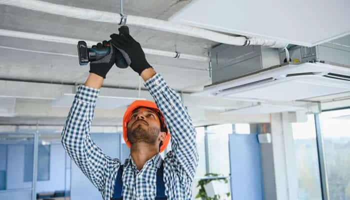 What duct cleaning actually does - tycoonstory | tycoonstory media Air duct cleaning technician servicing commercial hvac ductwork to clear accumulated debris, improve ventilation, and maintain efficient heating and cooling systems.