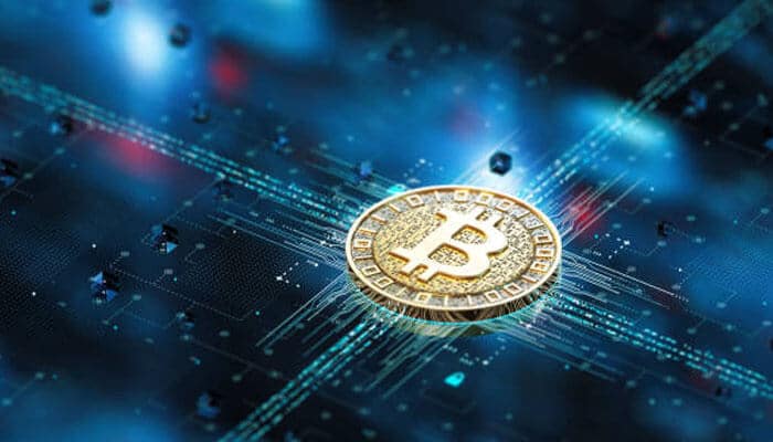 Crypto infrastructure could become the picks-and-shovels opportunity | tycoonstory media Crypto opportunities highlighted by a bitcoin on blockchain technology, representing digital assets, secure transactions, and future investment potential.