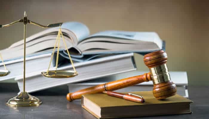 The legal principles that stay constant | tycoonstory media Law books, gavel, and scales representing personal injury law and accident claim justice