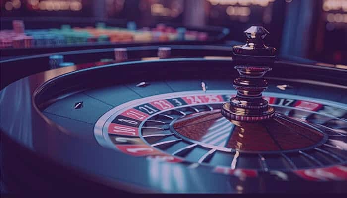 How games began to evolve | tycoonstory media Casino entertainment concept showing a modern roulette table with digital lighting, representing the evolution of online gaming experiences.