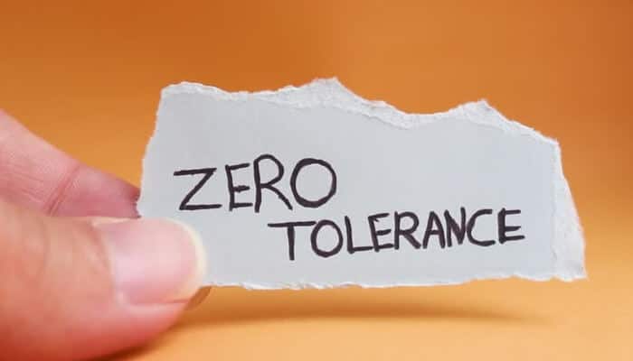 The psychology behind zero tolerance | tycoonstory media Zero tolerance policy concept highlighting rules and protections for australian consumers.