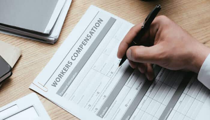 Understanding the workers' compensation appeals process in south carolina | tycoonstory media Workers’ compensation claim denied form being completed after a workplace injury, highlighting the claims process, legal documentation, and appeal preparation.