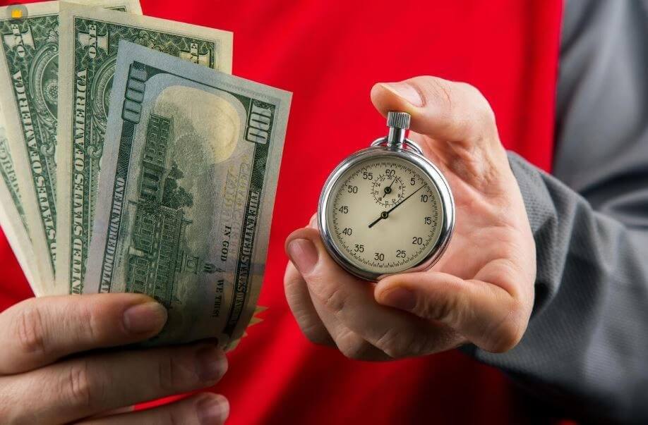 Timing of us money transfer and its importance - tycoonstory | tycoonstory media Sending money from india to the usa with a stopwatch and us dollar bills, highlighting the importance of transfer speed, real-time exchange rates, secure international remittances, forex conversion, processing time, and cost-effective cross-border payments.