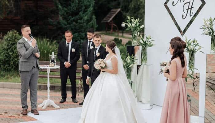 Weddings sort of sit in between - tycoonstory | tycoonstory media Wedding ceremony using professional speaker rental for events with wireless microphones and premium pa speakers, ensuring clear speeches and balanced audio for outdoor celebrations.