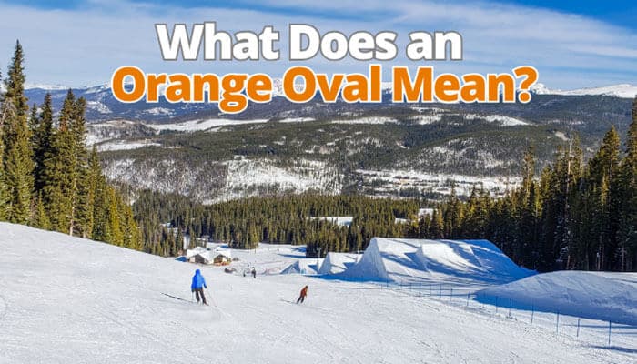 What does an orange oval mean - tycoonstory | tycoonstory media What is ski slope difficulty rating explained with an orange oval terrain park marker on a snowy ski resort trail showing freestyle skiing area classification and mountain slope levels