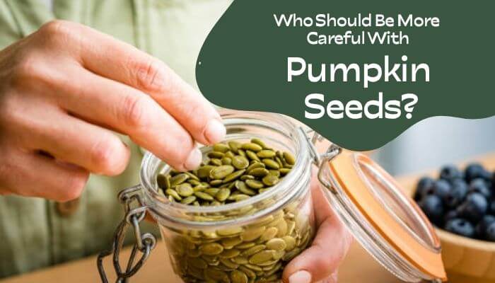 Disadvantages of eating pumpkin seeds - tycoonstory | tycoonstory media Disadvantages of eating pumpkin seeds, showing a person taking seeds from a glass jar and highlighting who should consume them cautiously.