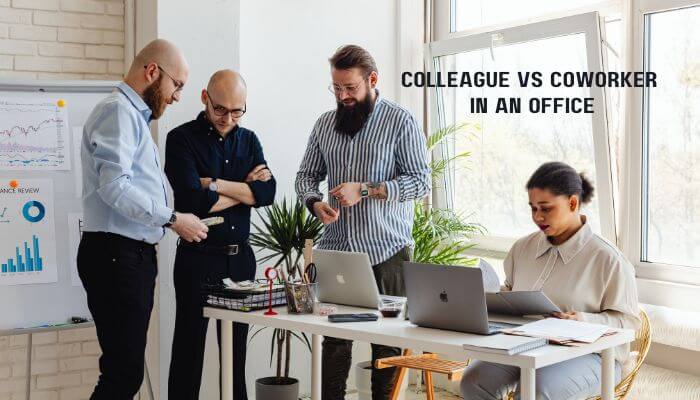 Colleague vs coworker in an office 1 | tycoonstory media Colleague vs coworker in an office with professionals working and collaborating together