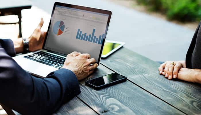 Does ppc affect seo for local businesses - tycoonstory | tycoonstory media Does ppc affect seo? A marketer analyzing ppc data and seo metrics to understand how paid search insights support organic search optimization strategies.