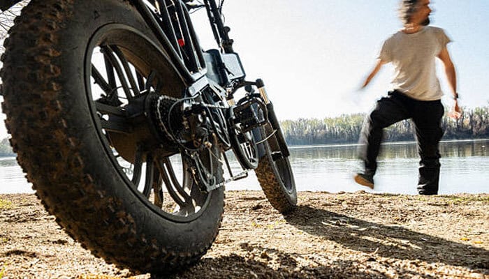 How do tires and suspension affect fast riding? | tycoonstory media Fast e-bike with fat tires designed for powerful off-road riding, improved stability, and high-performance outdoor adventures.