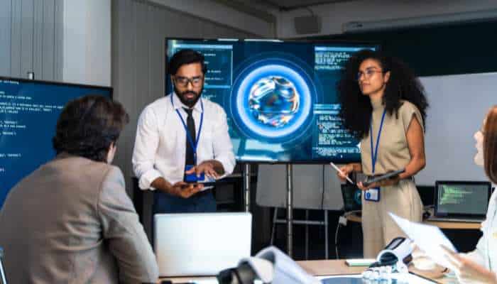 Why so many ai automation projects get canceled before they finish 1 | tycoonstory media Business team presenting an ai strategy during a meeting, highlighting ai automation projects focused on planning, collaboration, and digital transformation.
