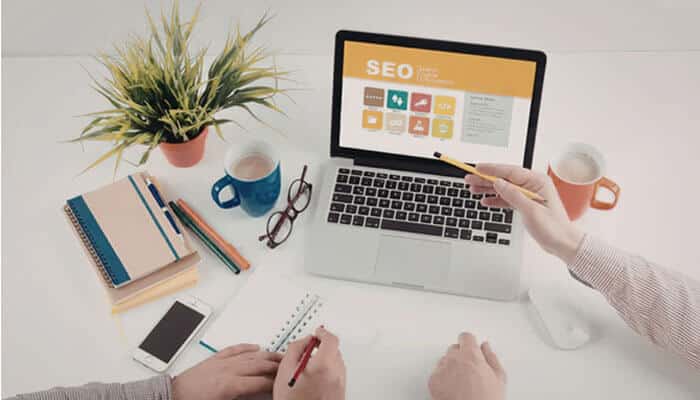 How to build an inbound marketing content marketing strategy - tycoonstory | tycoonstory media Inbound marketing content marketing strategy with marketers reviewing seo performance, content optimization, and digital marketing on a laptop.