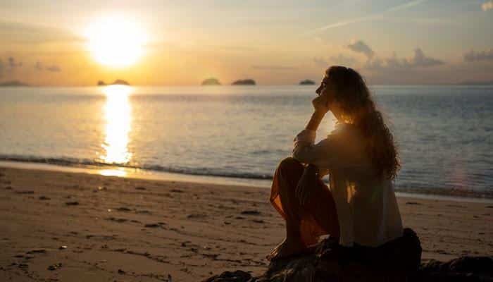 3333 angel number meaning after a breakup - tycoonstory | tycoonstory media 3333 angel number meaning after a breakup shown through a peaceful beach scene with a person reflecting at sunset, representing emotional healing, self-growth, new beginnings, inner peace, and spiritual transformation through numerology symbolism.