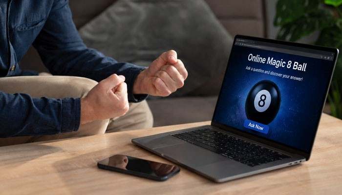 Benefits of using a magic 8 ball online - tycoonstory | tycoonstory media Magic 8 ball online interactive digital fortune tool displayed on a laptop screen, allowing users to ask yes or no questions and receive instant random answers for fun decision-making