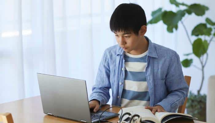 Create valuable content - tycoonstory | tycoonstory media Hubspot for startups content creation strategy showing an entrepreneur working on a laptop to develop digital marketing, crm, and scalable business growth solutions