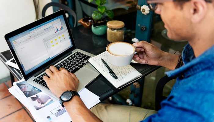 Stronger content creates more competition | tycoonstory media Business professional analyzing online reputation and managing a bad search result strategy on a laptop