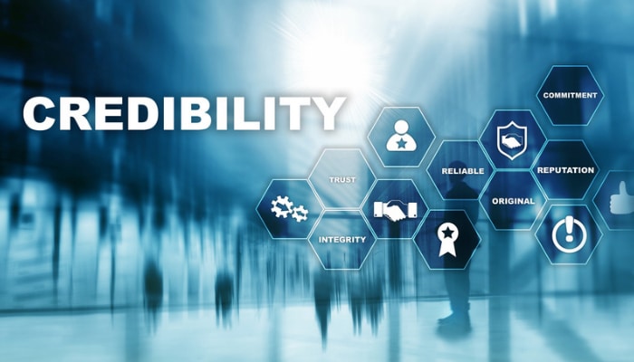 How new businesses overcome the _nobody follows us yet_ problem 1 | tycoonstory media Blue abstract image with the word credibility and hexagonal icons symbolizing trust, integrity, reliability, and reputation.