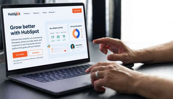 How to avoid fake hubspot discount codes - tycoonstory | tycoonstory media Hubspot promotion code guide showing a business professional using hubspot crm dashboard on a laptop to explore software discounts, deals, and subscription savings