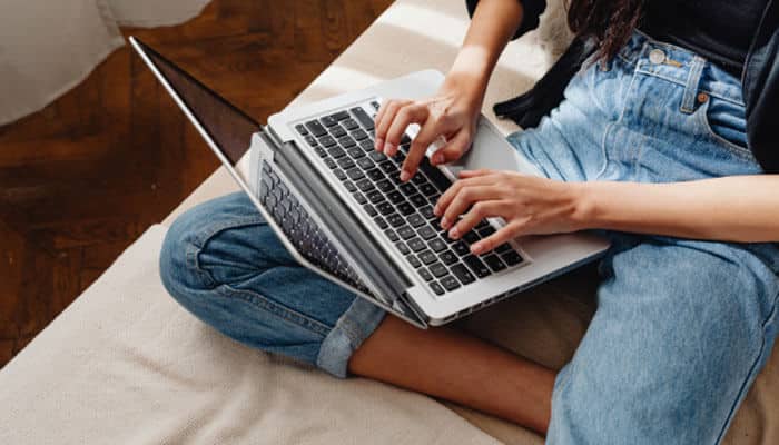 How to reset a forgotten pikmykid staff password - tycoonstory | tycoonstory media Pikmykid staff login password reset guide showing a user accessing a laptop to recover account credentials and manage secure school dashboard access.