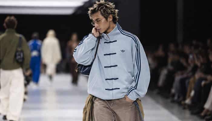How to choose the correct adidas chinese new year jacket size - tycoonstory | tycoonstory media Adidas chinese new year jacket 2026 displayed in a runway-inspired fashion setting with adidas originals styling, traditional knot closures, loose fit design, and contemporary streetwear trends.
