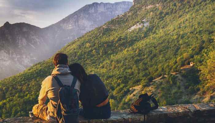 Lack of routine - tycoonstory | tycoonstory media Aquarius and gemini compatibility represented by a couple enjoying a peaceful mountain journey, symbolizing emotional connection, shared adventures, freedom, communication, and the importance of balancing excitement with stability in a relationship.