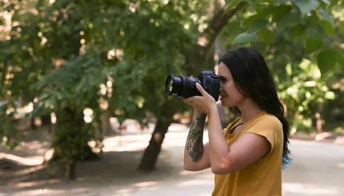 Practice controlled breathing techniques - tycoonstory | tycoonstory media How to fix shaky hands photography by practicing stable camera holding techniques, proper posture, controlled breathing, and handheld shooting methods to capture sharp outdoor photos without camera shake