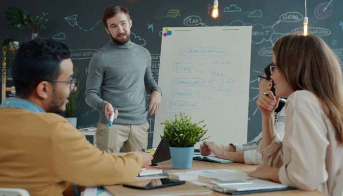 Product-market fit - tycoonstory | tycoonstory media Business jargon concepts discussed during a professional team meeting with entrepreneurs analyzing strategy, planning ideas, startup communication, and workplace terminology on a presentation board.
