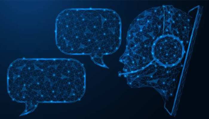 What clinics should actually check before letting ai answer patient calls 1 | tycoonstory media Blue low-poly illustration of a headset-wearing head with two chat bubbles, representing ai chat support.