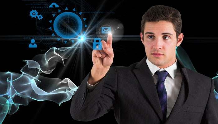 Technology cannot automate trust | tycoonstory media Businessman in a suit taps a holographic digital interface with glowing blue icons.
