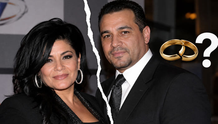 Is antonimar mello still married to lisa lisa - tycoonstory | tycoonstory media Ai-generated illustration representing antonimar mello and lisa lisa's relationship, featuring a separated couple and broken wedding rings.